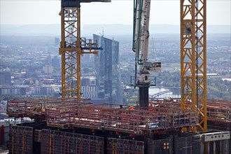 Large construction site with the project name Four Frankfurt with a view of the European Central Bank ECB
