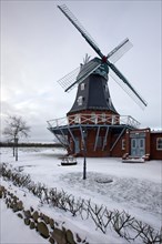 Windmill in the snow in winter