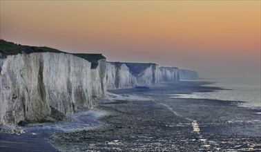 Chalk cliffs along the English Channel at sunset near the village Ault