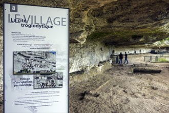 Information panel at the fortified troglodyte town La Roque Saint-Christophe