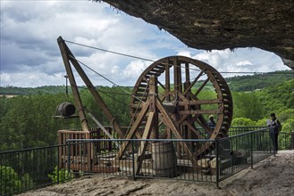 Medieval treadwheel crane at the fortified troglodyte town La Roque Saint-Christophe