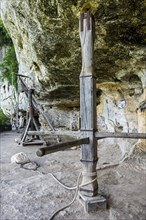 Wooden medieval capstan at stone quarry in the fortified troglodyte town La Roque Saint-Christophe