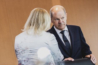 (R-L) Olaf Scholz (SPD), Federal Chancellor, and Nancy Faeser (SPD), Federal Minister of the