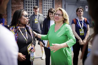 (R-L) Svenja Schulze, Federal Minister for Economic Cooperation, pictured on a tour talking to