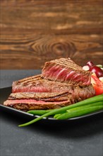 Roasted juicy tri-tip loin beef steak