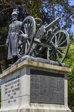 War memorial with soldier and cannon