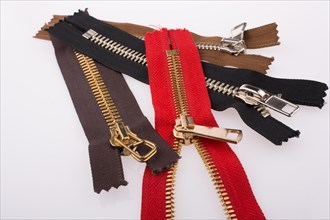 Color zippers on a white background