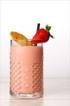 Close-up of a strawberry milkshake with natural strawberries