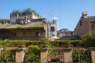 TV Antennas on the Roofs of the Old Town of Rome in a Sunny Day in Lazio