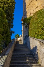 Staircase to Church Oratory of S. Antonio da Padova in Santa Maria del Sasso Against Blue Clear Sky on Mountain in a Sunny Day in Morcote