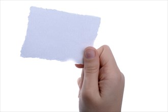 Hand holding a piece of blank torn notepaper