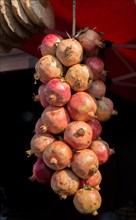 Ripe pomegranate fruit at a market place for sale