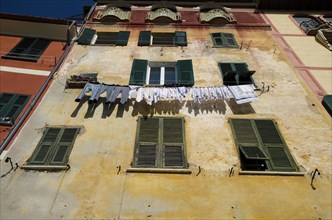 Drying Clothes on Wasging Line Outside on an Old Building in Liguria