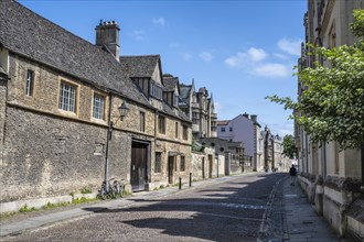 Merton Street with cobblestones and historic houses in the old town of Oxford