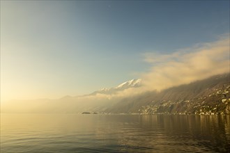 Alpine Lake Maggiore with Mountain and Sunlight
