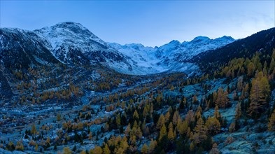 Aerial view of Val Morteratsch with the Morteratsch glacier and its mountain world in autumn