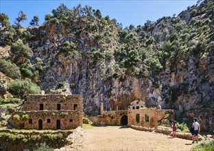 Ruins of remote abandoned Orthodox Katholiko monastery and bridge over Avlaki gorge near Gouverneto moni