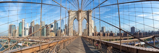 Brooklyn Bridge in New York City Manhattan skyline with World Trade Center skyscraper panorama in New York