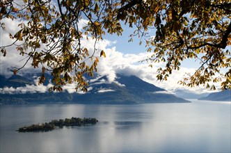Brissago Islands on an Alpine Lake Maggiore in autumn with Branches in Ticino