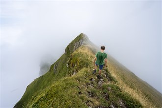 Climbers on a narrow ridge