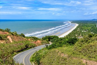 Beautiful road along the coast of the state of Bahia next to the beaches of Pe de Serra and Sargi in Serra Grande