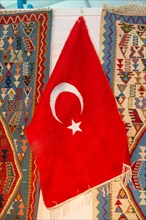 Turkish national flag hang in view in open air