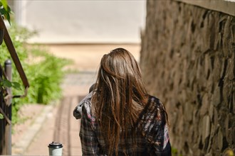 Back view of long haired man