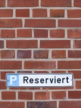 Sign with inscription Reserved