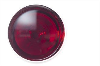 Glass with Red Wine on White Background