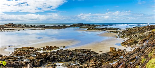 Panoramic image of a beautiful deserted and rocky beach in Serra Grande on the south coast of the state of Bahia