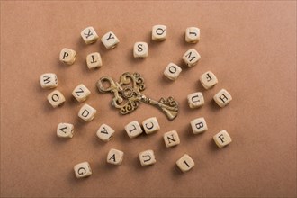 Letter cubes of made of wood around retro key