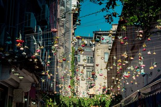 Floral art made of colorful artificial flowers as street decoration