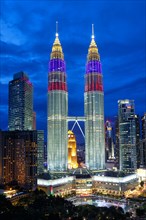 Petronas Twin Towers skyscrapers KLCC skyline in the evening of Kuala Lumpur