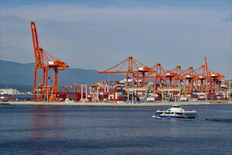 Industrial port with containers and cranes