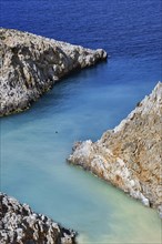 Sharp z-shaped cove in cliffs of Cretan sea shores