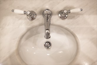 Retro Styled Bathroom Sink with Water Faucet in France