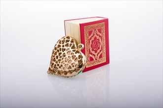 Heart shape and Islamic Holy Book Quran mini size