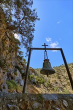 Church bell of remote Orthodox church of St John the Hermit in Cretan hills of Akrotiri peninsula