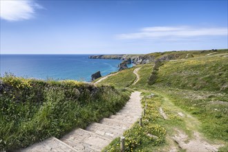 Footpath along the rugged coastline to the Bedruthan Steps cliff formation