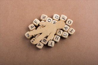 Paper man and letter cubes of made of wood