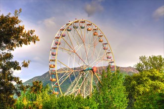 Ferris Wheel and Mountain in Switzerland