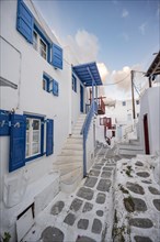 Cycladic white houses with colourful shutters