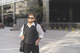 Business man posing on the street
