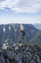 Mountaineer on a ridge path