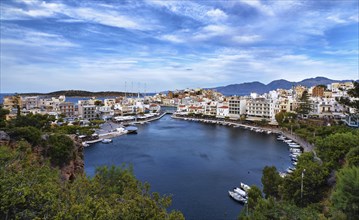Colorful view of Voulismeni lake and Agios Nikolaos town on Crete island