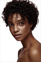 African American skincare models with perfect skin and curly hair. Beauty spa treatment concept