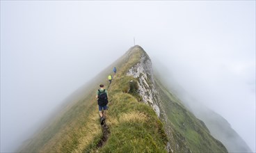 Climbers on a narrow ridge