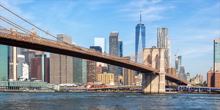 New York City Manhattan skyline with Brooklyn Bridge and World Trade Center skyscraper panorama in New York