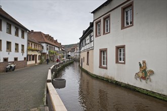 Old town of Annweiler with the small river Queich