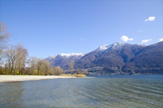 Beach with Snow-capped Mountain in Ascona